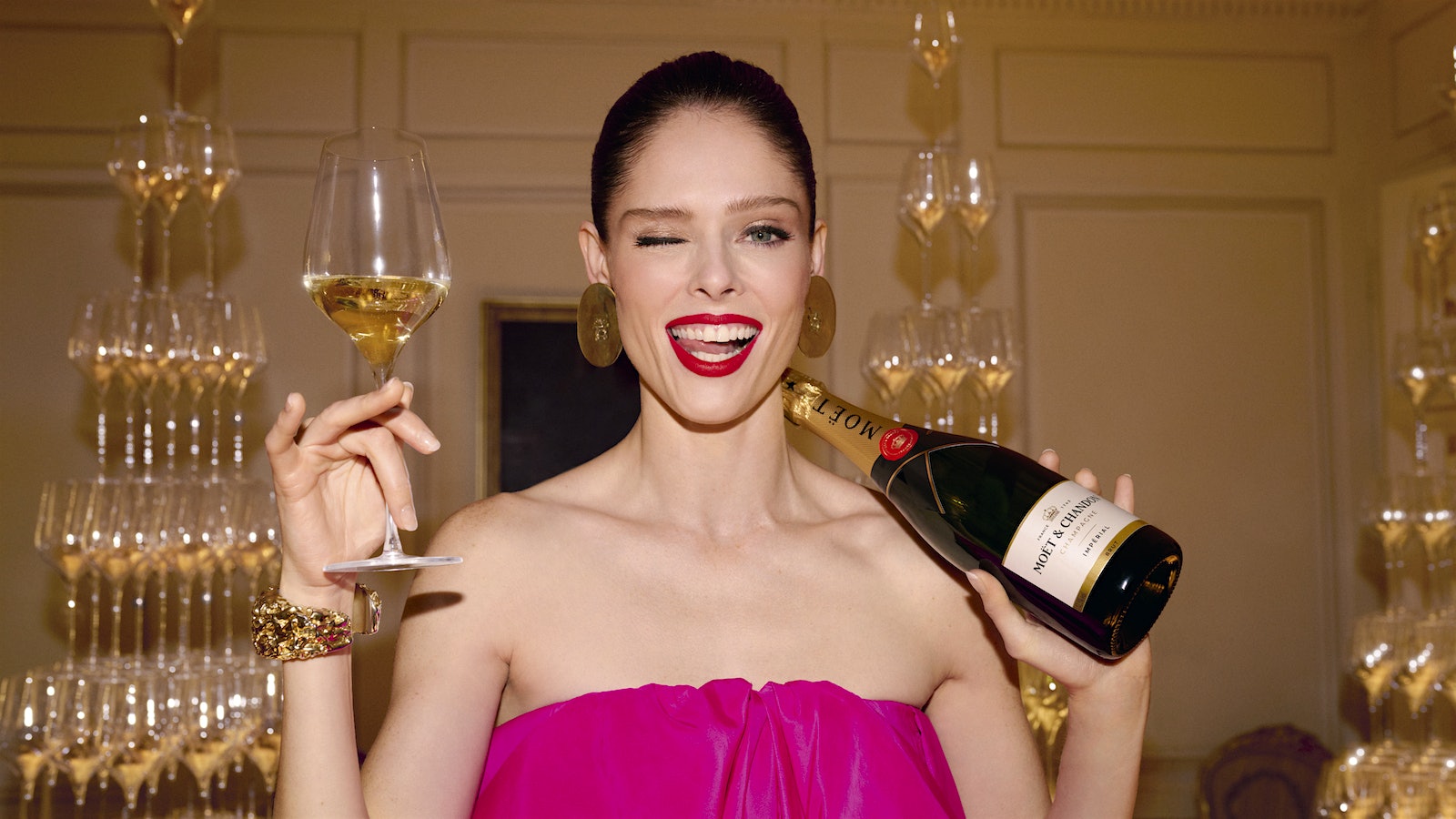 Model Coco Rocha serves Moet and Chandon Champagne.